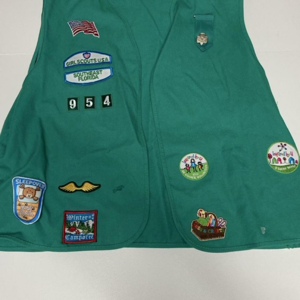 Green Girl Scout vest with patches #girlscouts #outdoors
